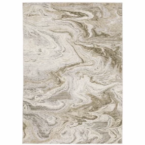 6' X 9' Beige And Ivory Abstract Power Loom Stain Resistant Area Rug