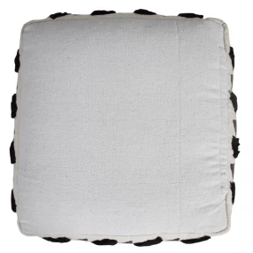 White cotton ottoman with beige fashion accessory and metal serveware details