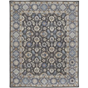 tufted handmade stain resistant area rug with beige pattern and symmetrical design