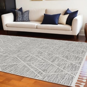 machine woven geometric indoor area rug with black and white design in modern interior