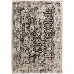 black oriental area rug with fringe and beige pattern