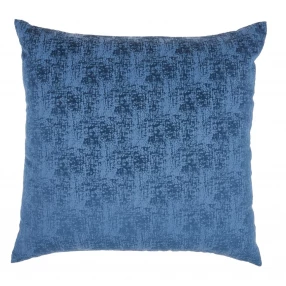 navy blue distressed gradient throw pillow on aqua chair with azure and grey textile design