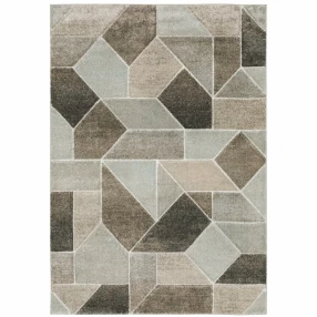 power loom stain resistant area rug in brown grey and beige on tile flooring