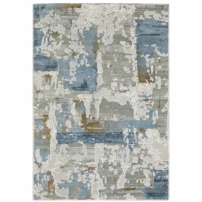 10' X 13' Grey Blue Navy Ivory And Brown Abstract Power Loom Stain Resistant Area Rug