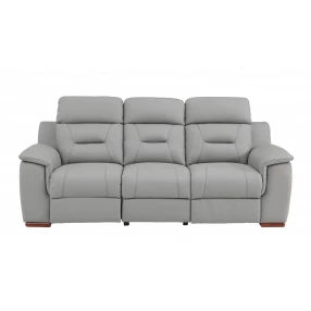 Gray brown faux leather sofa in a comfortable rectangular design with patterned details