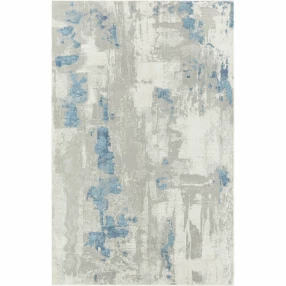 blue abstract stain resistant area rug with beige and electric blue pattern