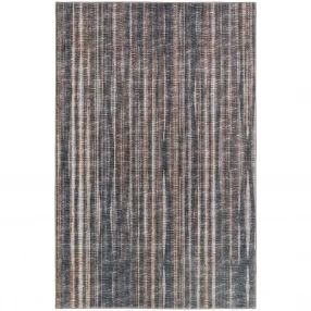 brown ombre tufted handmade area rug with grey and wood tones in a rectangle shape