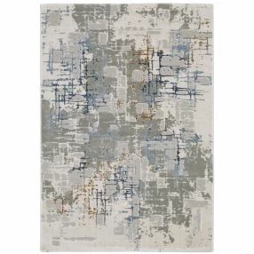 5' X 8' Grey Blue Brown Ivory And Deep Blue Abstract Power Loom Stain Resistant Area Rug