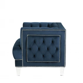 Blue velvet black tufted armchair with electric blue pattern and fashion accessory elements