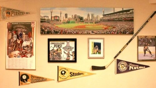 Express Your Team Spirit with a Sophisticated Sports Memorabilia Wall